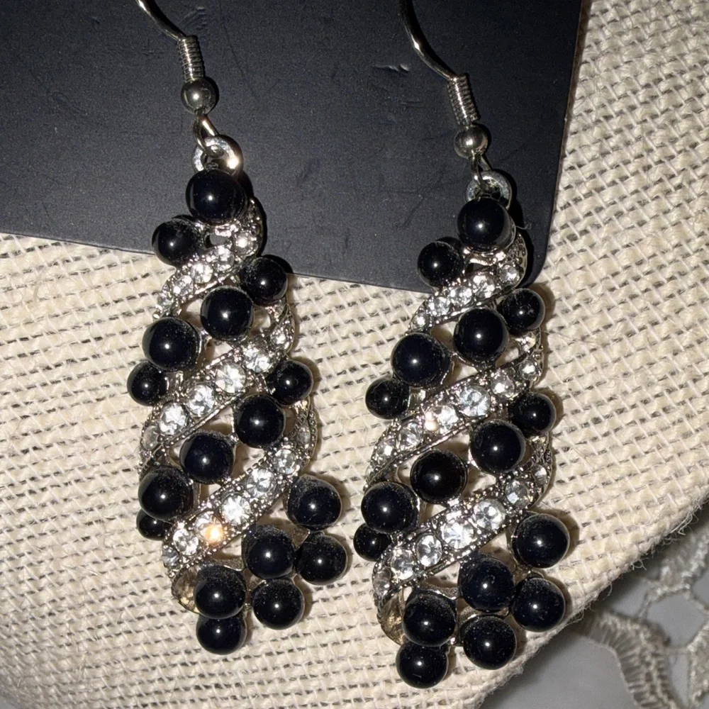 Paparazzi Twisted Black and Silver Earrings - Picture 2 of 5